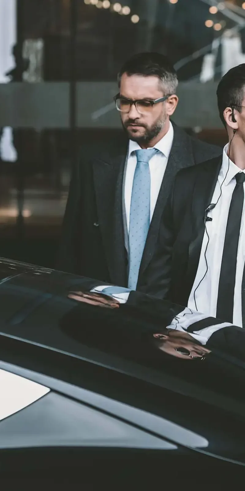 bodyguards-going-with-businessman-and-reviewing-te-KDUBVW5.jpg